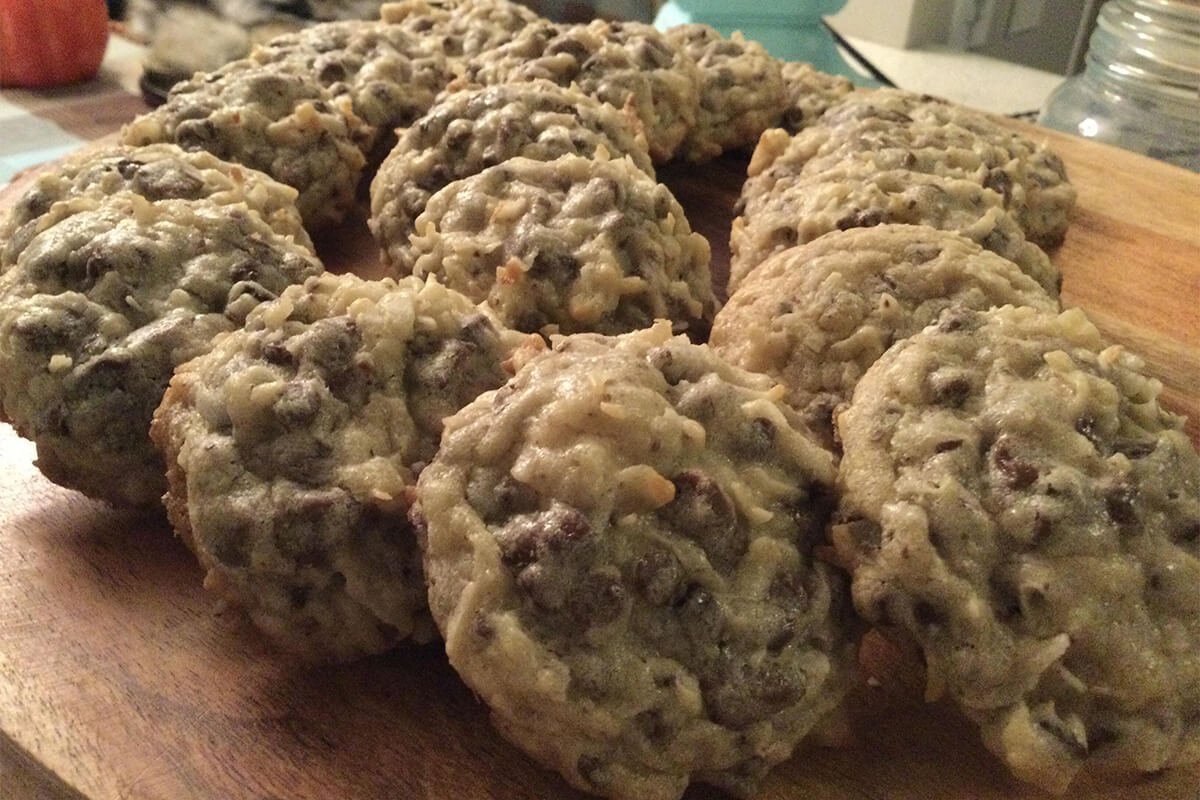 Close-up of Almond Joy cookies on a wooden board