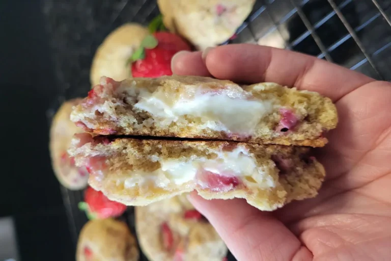 Strawberry cheesecake cookie oozing with creamy filling