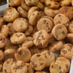 Basket of fresh mini chocolate chip cookies.