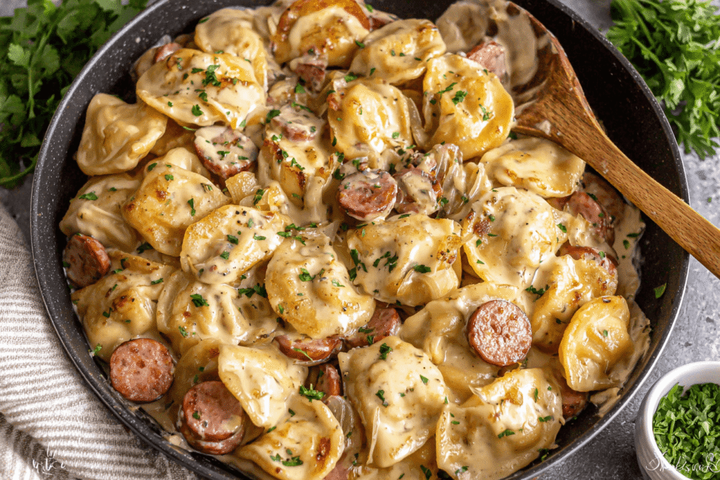 Cheesy Perogies with Sausage and Onions Recipe